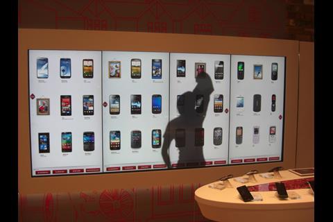 Virgin Media has unveiled a new format store featuring interactive shopping walls